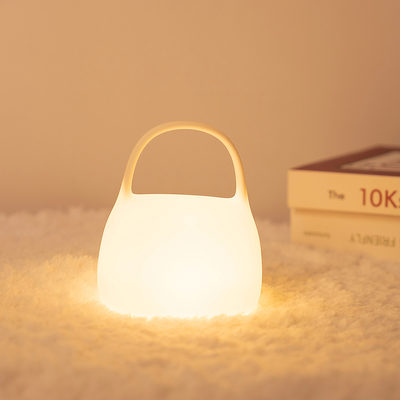 DIY Creative Gift Handbag Silicone Lampada da applauso con tempo Decorazione a bordo letto Atmosfera Luce notturna per dormire